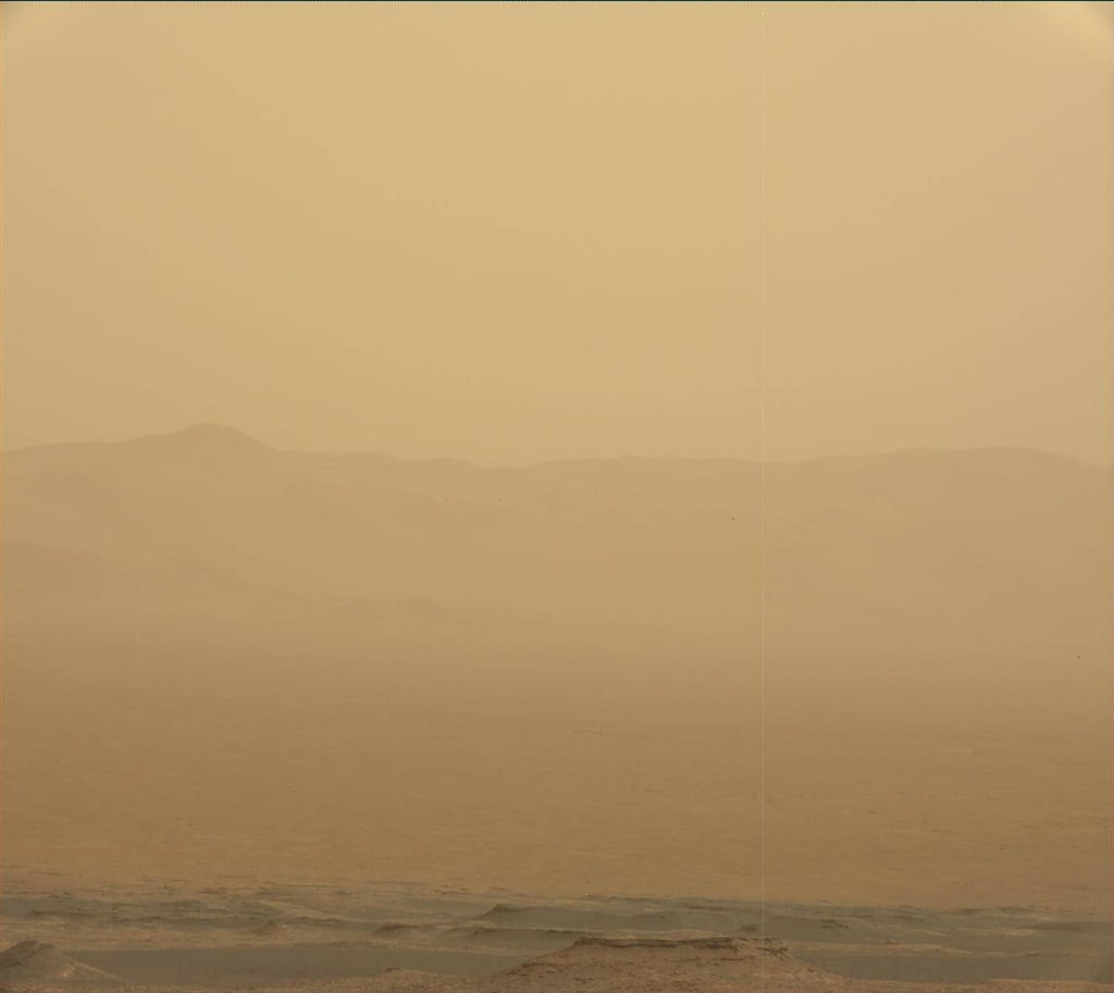 View of Gale Crater rim as dust storm is beginning in 2018, NASA