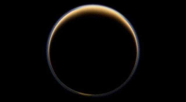 Backlight image of the Saturn Moon Titan showing methane haze in the atmosphere, NASA